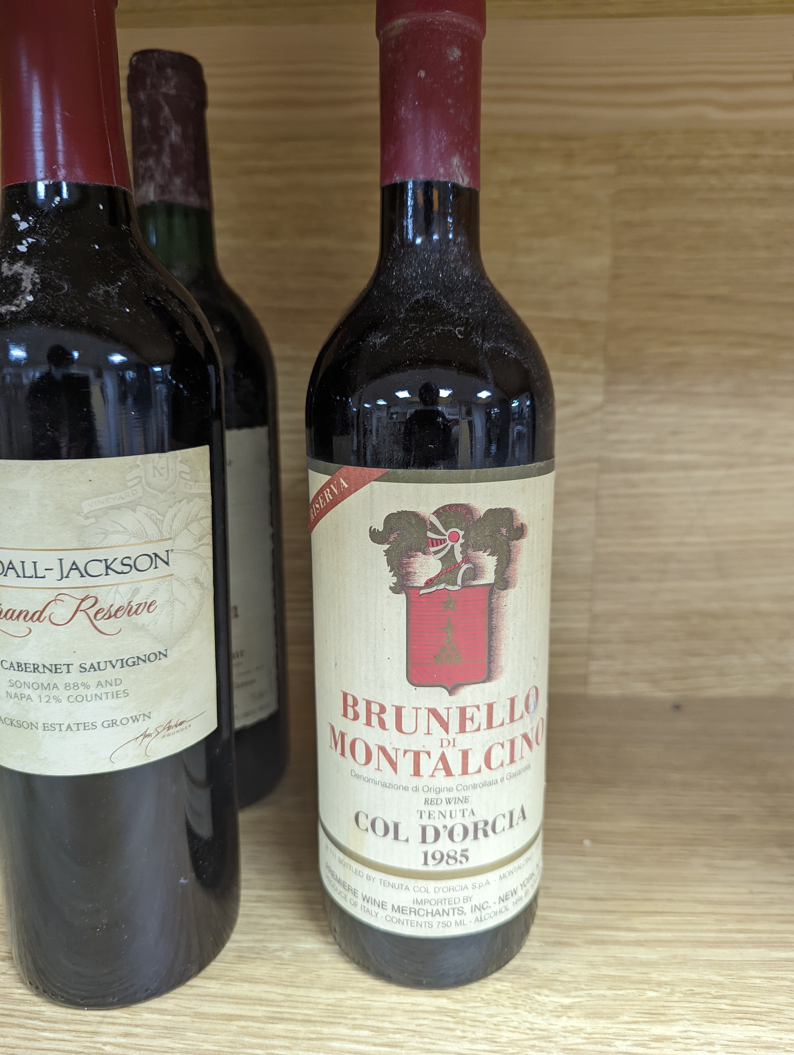 Twelve assorted bottles of wine including one Opus One, 1988, one Vosne Romanee, Jean Paul Selles, 1992, one Chateau Cazauviel, Margaux 1993, Chateau Pontet-Canet, 1986 and Brunello Montalcino, 1985 & 1991 etc.